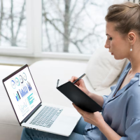 Woman analyzing data Woman analyzing data