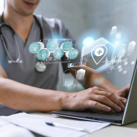 Medical professional with laptop. Medical professional with laptop.