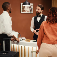Hotel check-in with guests Hotel check-in with guests